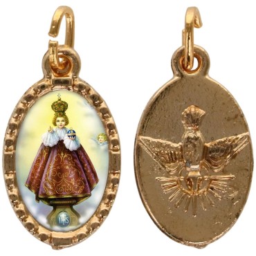 Médaille métal de couleur dorée ovale avec rebord effet dentelle H.1.5 cm avec résine. Disponible avec différents Saints.
