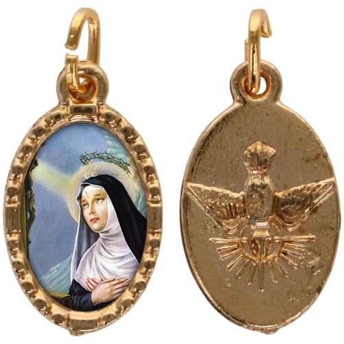 Médaille métal de couleur dorée ovale avec rebord effet dentelle H.1.5 cm avec résine. Disponible avec différents Saints.