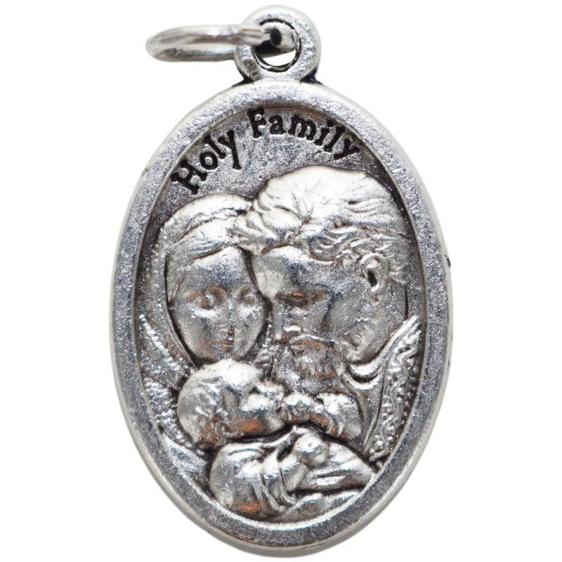 Médaille en métal couleur argentée forme ovale H. 2,2 cm. Plusieurs saints
