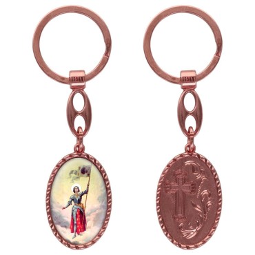 Porte-clés en aluminium de couleur cuivrée, hauteur 3,8 cm, avec résine. Disponible avec plusieurs saints au choix.
