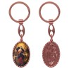 Porte-clés en aluminium de couleur cuivrée, hauteur 3,8 cm, avec résine. Disponible avec plusieurs saints au choix.