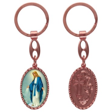 Porte-clés en aluminium de couleur cuivrée, hauteur 3,8 cm, avec résine. Disponible avec plusieurs saints au choix.