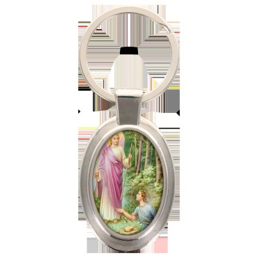 Porte-clés en métal de couleur argenté de forme ovale H. 4.3 cm. Livré en boite cadeaux. Existe avec différents Saints.