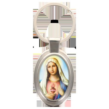 Porte-clés en métal de couleur argenté de forme ovale H. 4.3 cm. Livré en boite cadeaux. Existe avec différents Saints.